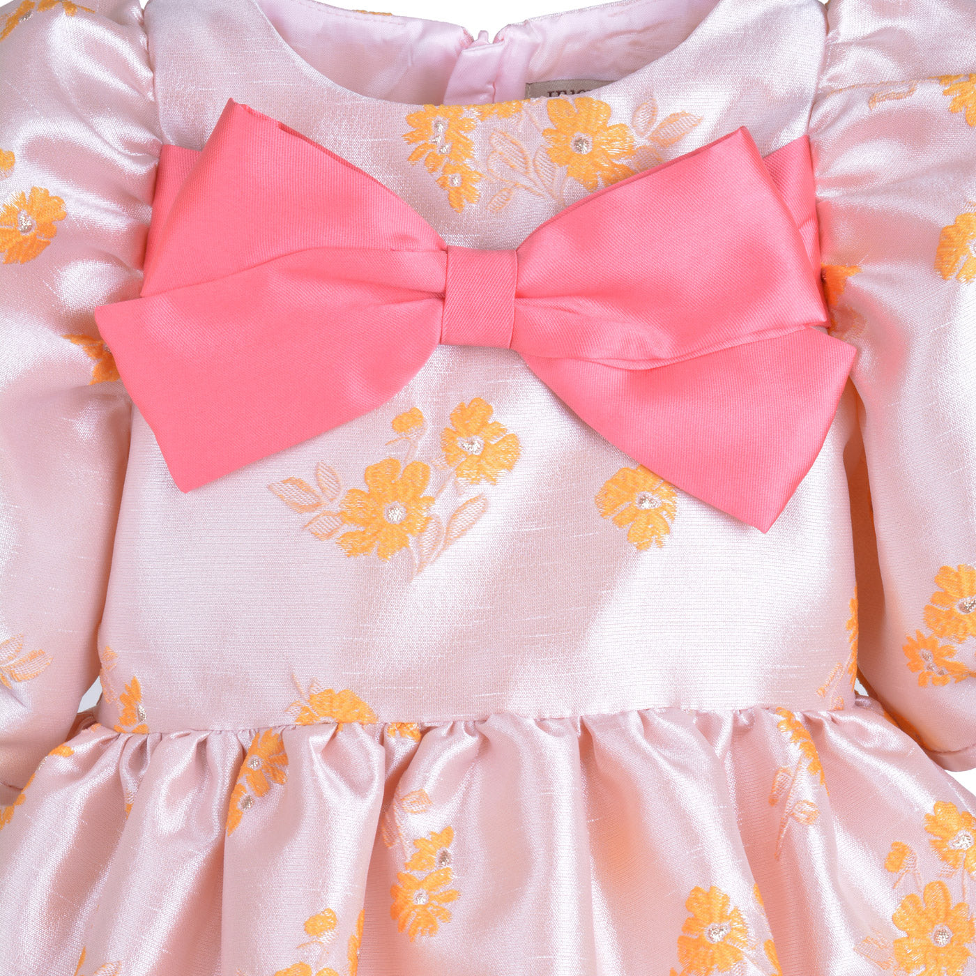 Pink floral bodice dress with large coral satin bow at center