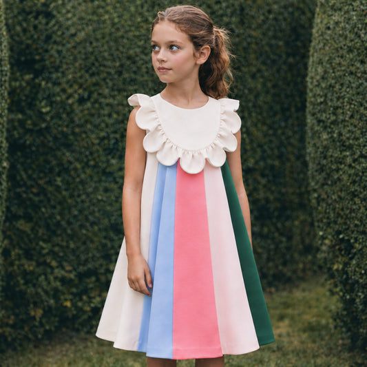 Girls' ruffle bib dress with white scalloped yoke and vertical pink, blue, green stripes