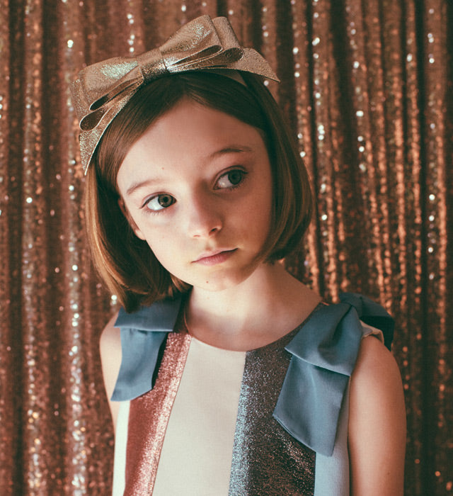 girl in dress and hairband
