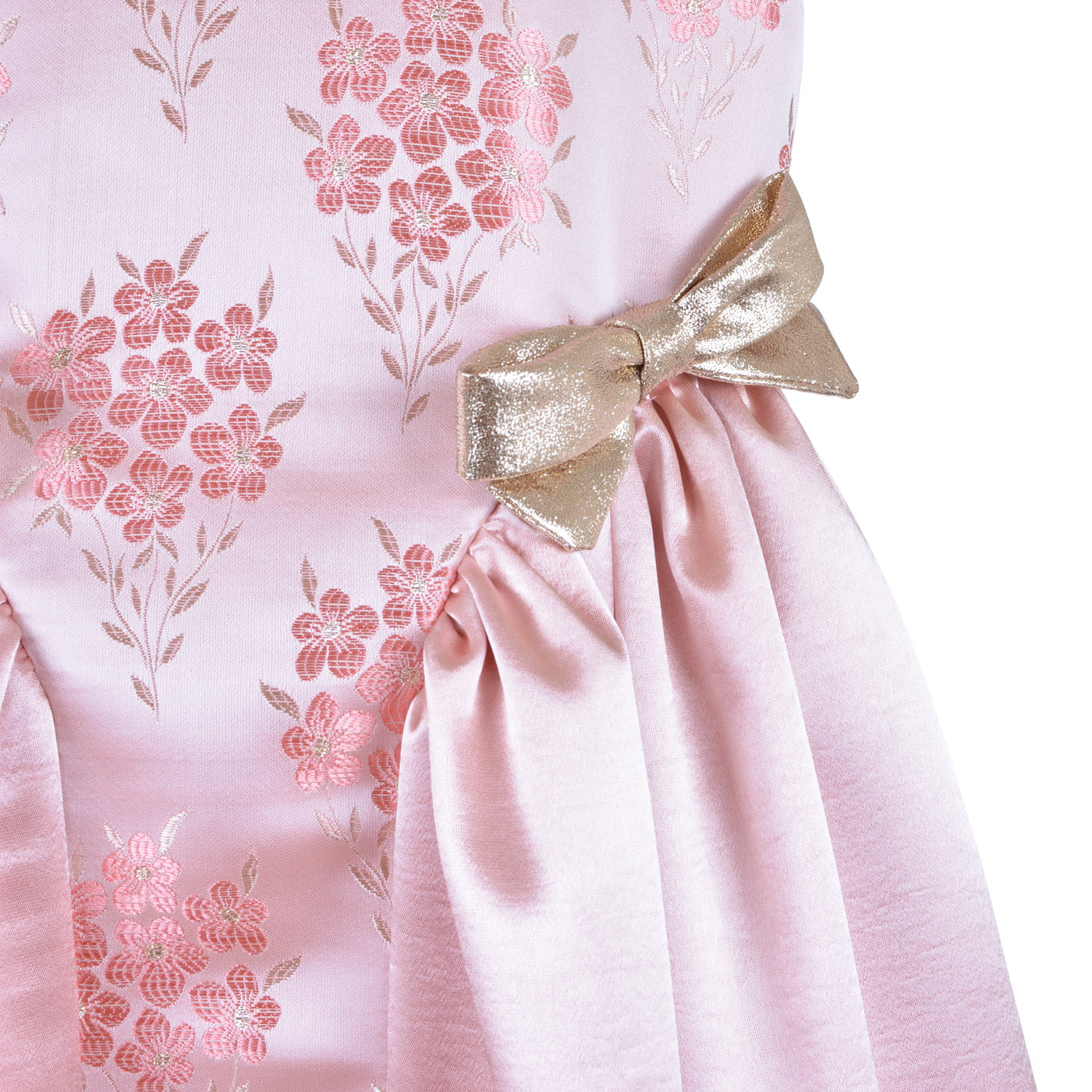 Pink floral midi dress with gold satin bow at gathered waist