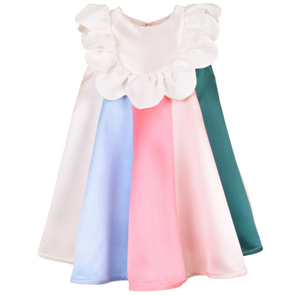 Rainbow dress with white ruffle bib and long puff sleeves; blue, pink, teal panels