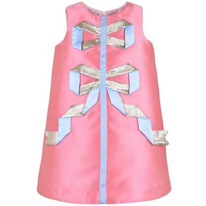 Pink satin shift dress with gold and light-blue origami ribbon bow appliques down front.
