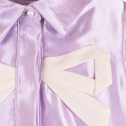 Lilac shirt dress close-up of button placket and faux pearl detail
