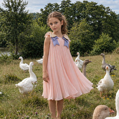 Light pink pleated trapeze dress, sleeveless, blue Peter Pan collar with neck bow