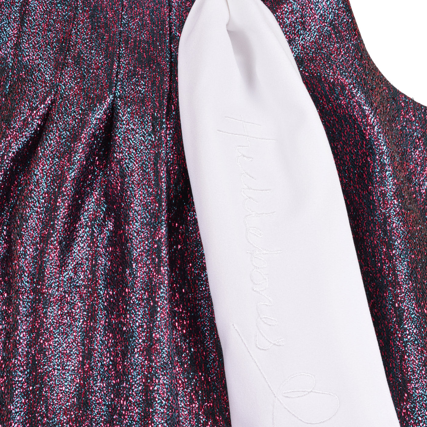 Speckled glitter dress with embroidered cursive on white neck tie, sleeveless