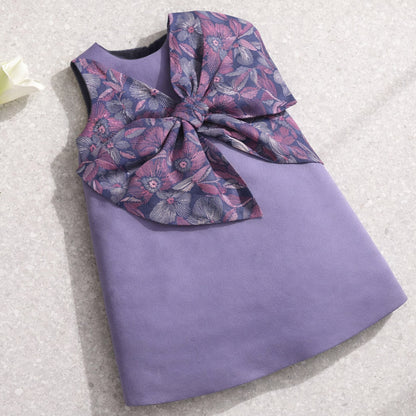 Lavender shift dress with oversized floral bow detail at waist