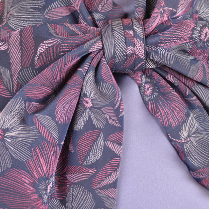 Floral bow detail on lavender shift dress bodice