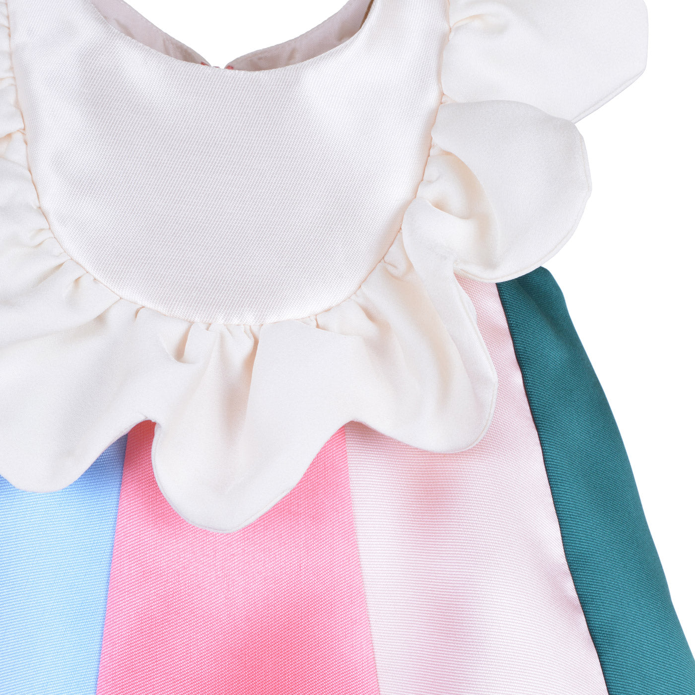 White ruffle bib dress with pink and blue color-block front panel