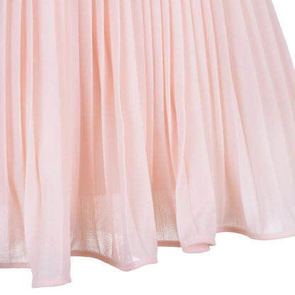 Pink pleated tulle skirt with subtle shimmer trim near the hem
