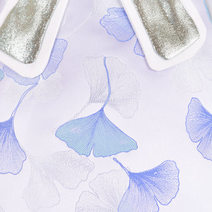 White dress fabric with raised blue ginkgo leaf pattern
