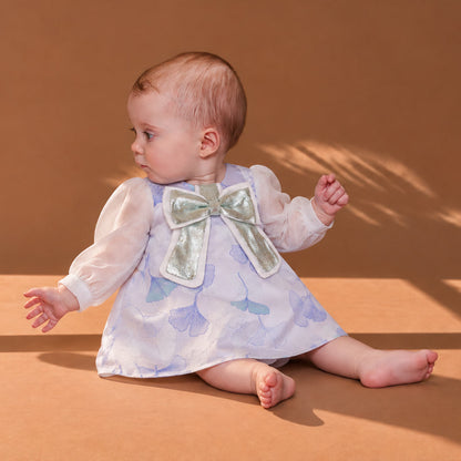 Infant long-sleeve shift dress with light blue floral print and satin bow