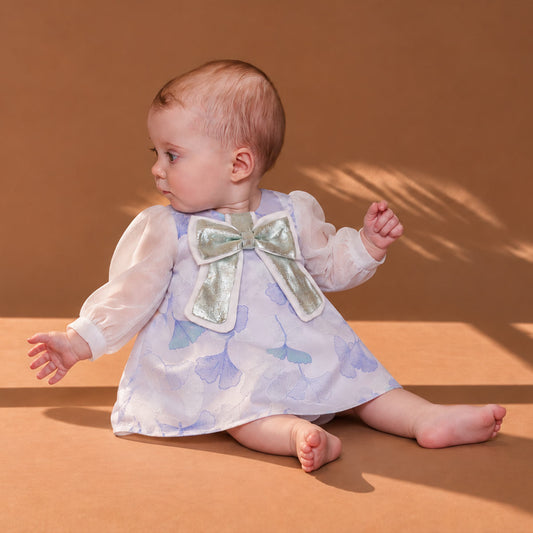 Infant long-sleeve shift dress with light blue floral print and satin bow