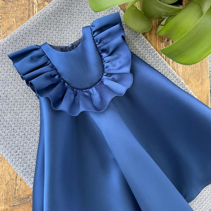 Blue ruffle bib trapeze dress with layered ruffle neckline