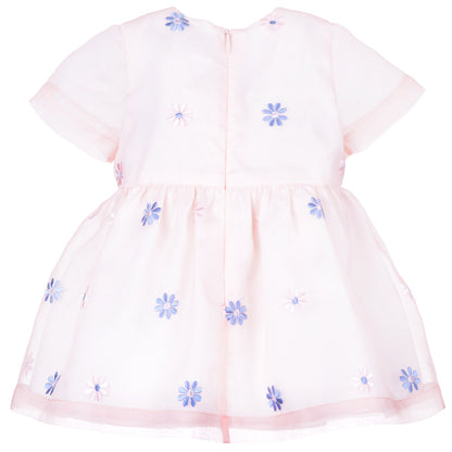 Mini bow bodice dress back view, white with blue flower print and gathered skirt