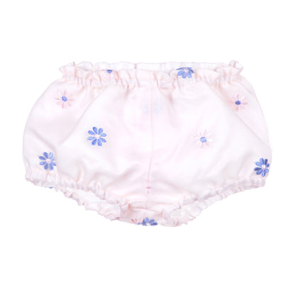 Matching bloomers with elastic waistband and blue flower pattern on pale fabric